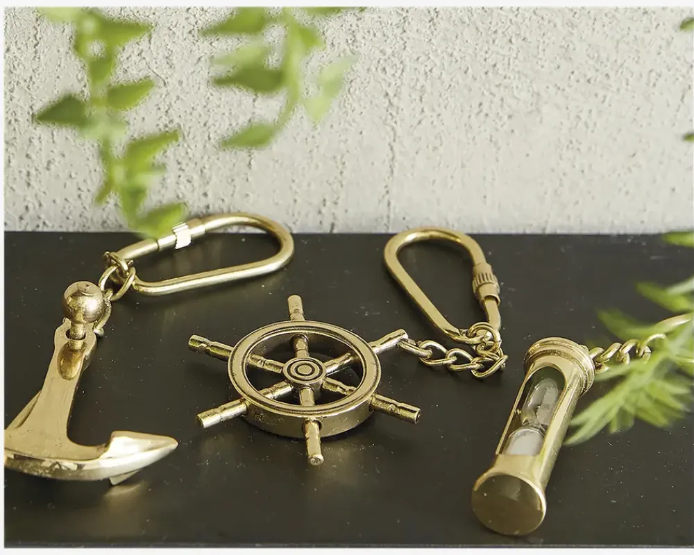 Best Daells Bolighus Nøglering guld ass L.12 cm